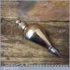 Nice quality vintage 3 3/4” steel tipped gunmetal plumb bob in good used condition.