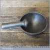 Vintage kitchenalia cast iron mortar and pestle with spout, in good used condition.
