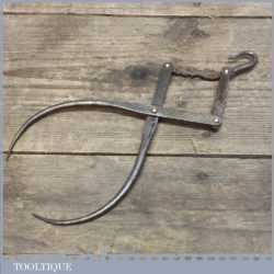 Early Unusual Pair of Cantilevered Callipers with Ornate Design