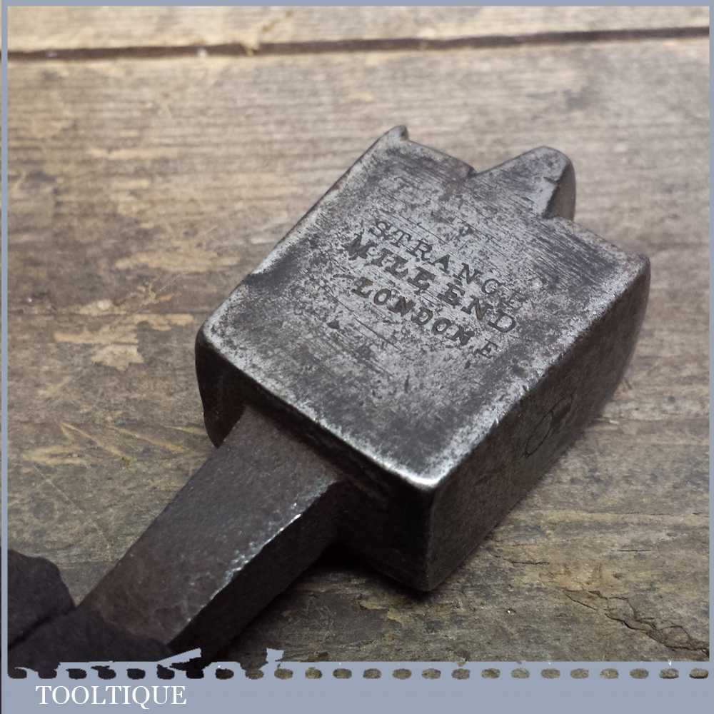 Antique leather working glazing iron marked Strange, Mile End, London