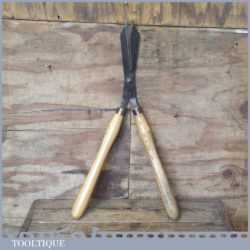 Vintage forged cast steel garden shears with beechwood handles in good used condition