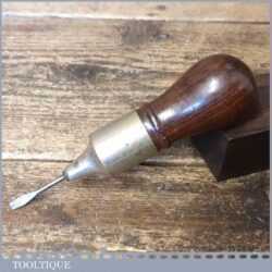 T19986 - Vintage 11-piece combination multi tool with rosewood handle in good used condition.