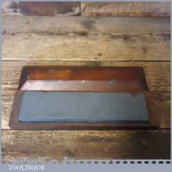 Vintage Peter’s 8” x 2” medium grit Carborundum oil stone in a wooden