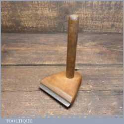 Vintage 3 ½” beechwood and steel veneer hammer in good used condition.