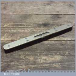 Antique Skulnick’s of Liverpool Rosewood Brass Level - Clear Bubble