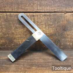 T26421 - Vintage carpenters ebony and brass sliding bevel with 9” blade in good used condition.
