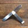T26421 - Vintage carpenters ebony and brass sliding bevel with 9” blade in good used condition.